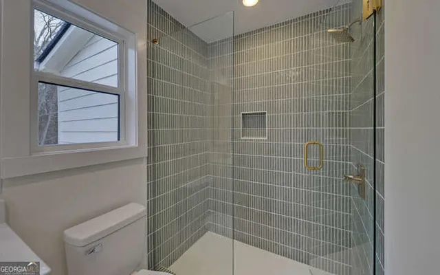 a view of deck with wooden floor and fence