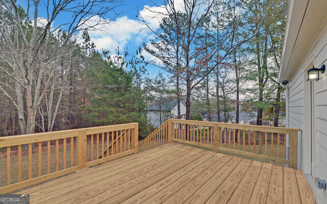 999 East Doyle Street Toccoa, GA 30577 - Photo 35 of 42 a view of deck with hardwood and trees