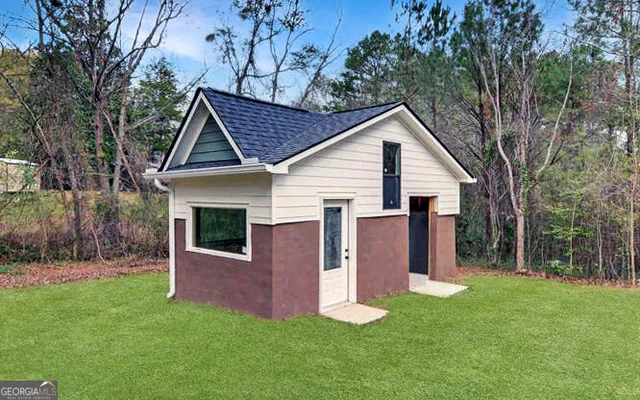 a view of a room that has a large window