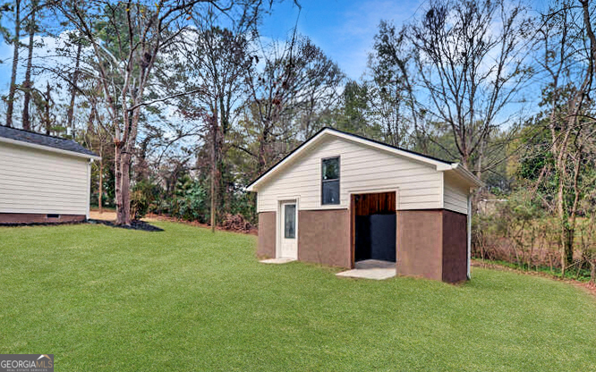 999 East Doyle Street Toccoa, GA 30577 - Photo 38 of 42 a view of a house with backyard