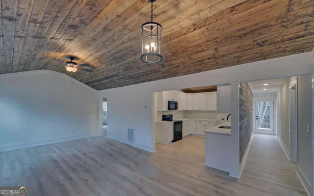 a very nice looking room with a wooden floor