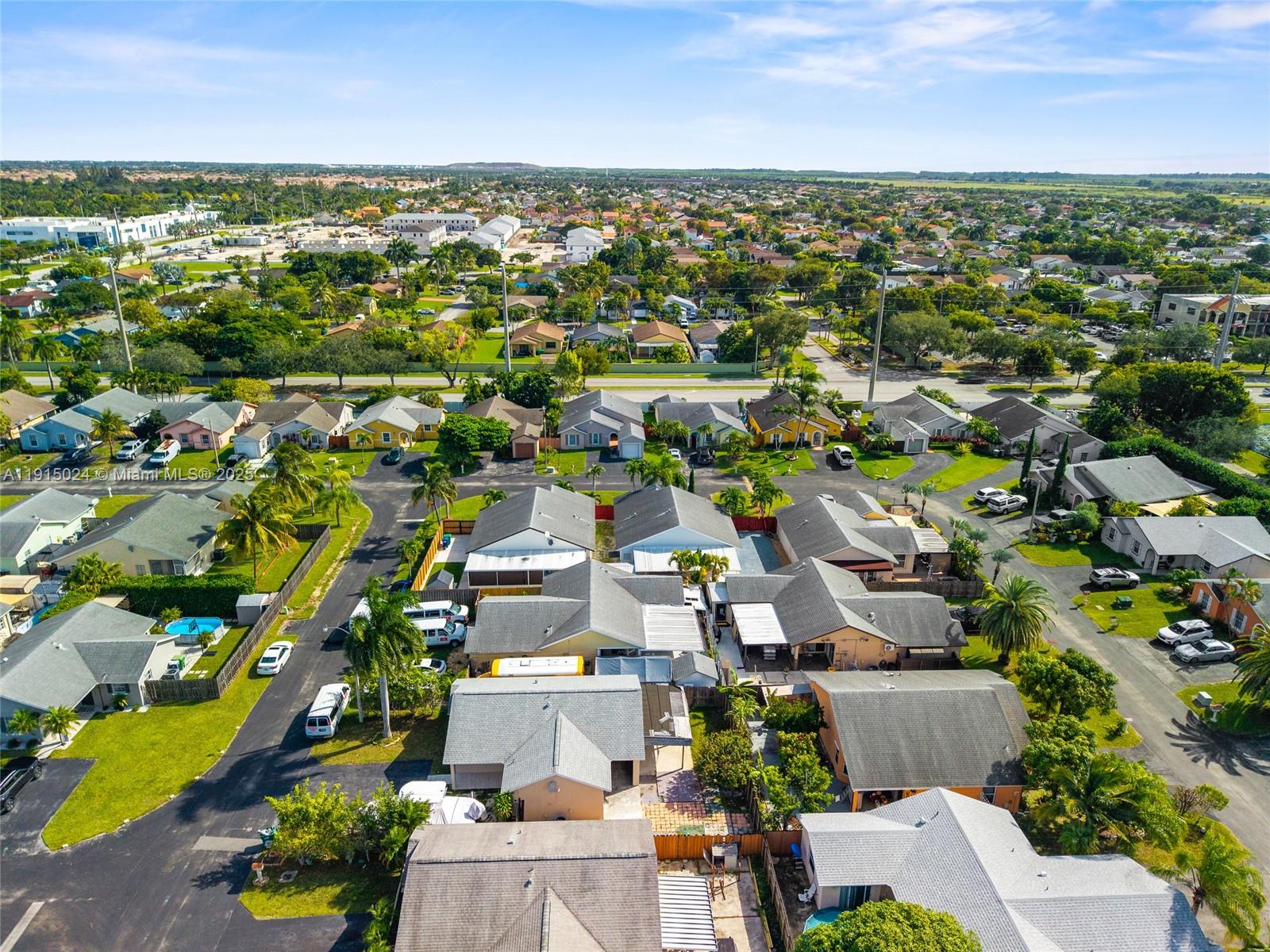 12740 Southwest 249th Terrace Homestead, FL 33032 - Photo 23 of 27 an aerial view of residential houses with outdoor space
