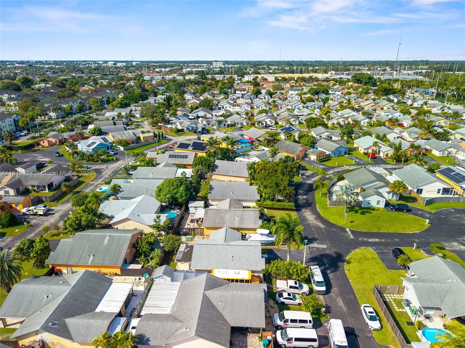 12740 Southwest 249th Terrace Homestead, FL 33032 - Photo 25 of 27 an aerial view of residential houses with outdoor space and trees