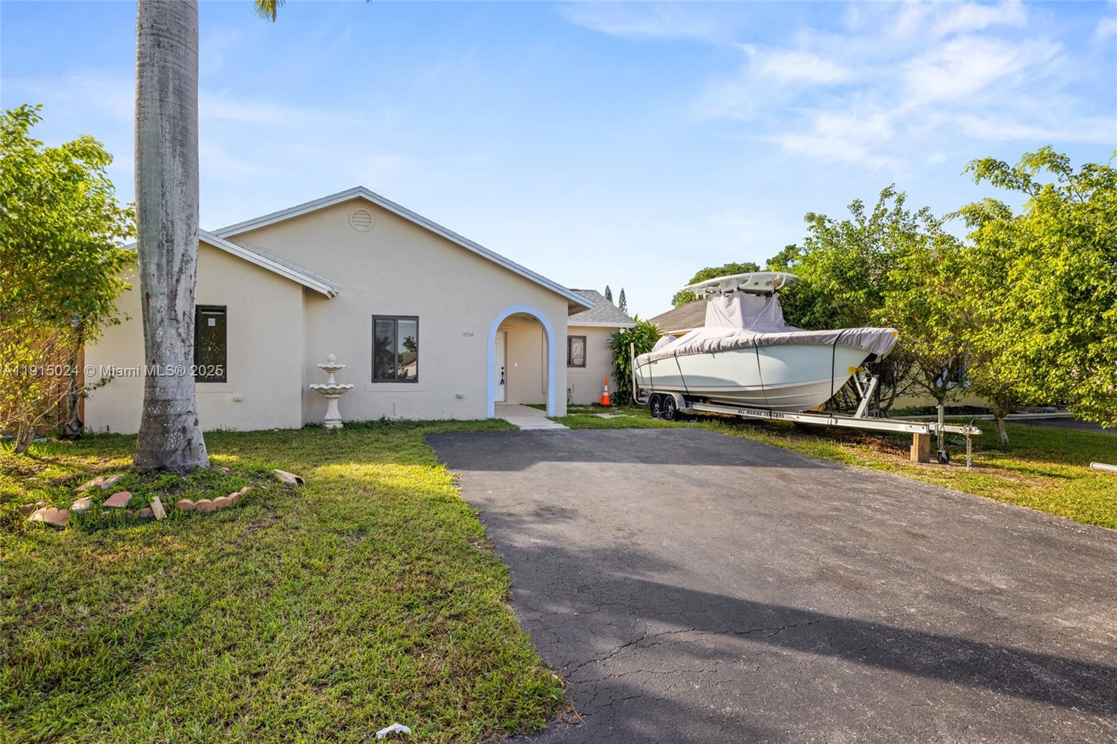 12740 Southwest 249th Terrace Homestead, FL 33032 - Photo 4 of 27 a view of a house with backyard