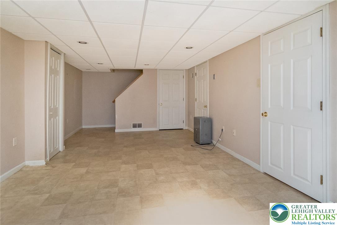 268 Apollo Drive Bethlehem, PA 18017 - Photo 37 of 56 A well-lit, finished basement offers versatile space with access to storage.
