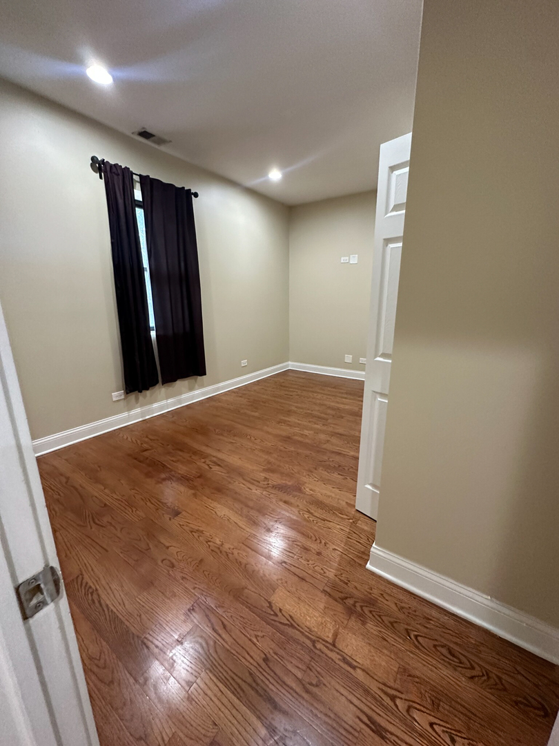 4336 South Indiana Avenue, Unit 1 Chicago, IL 60653 - Photo 13 of 15 a view of an empty room