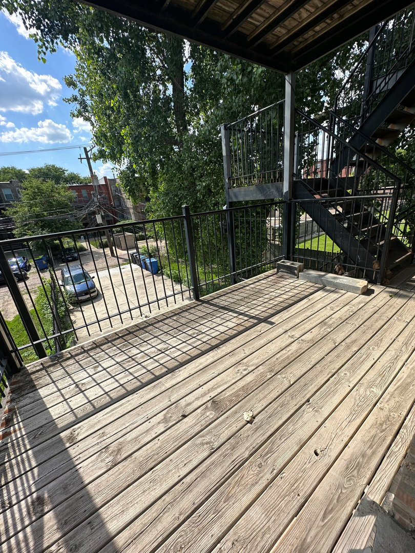 4336 South Indiana Avenue, Unit 1 Chicago, IL 60653 - Photo 15 of 15 a view of pathway along with wooden floor