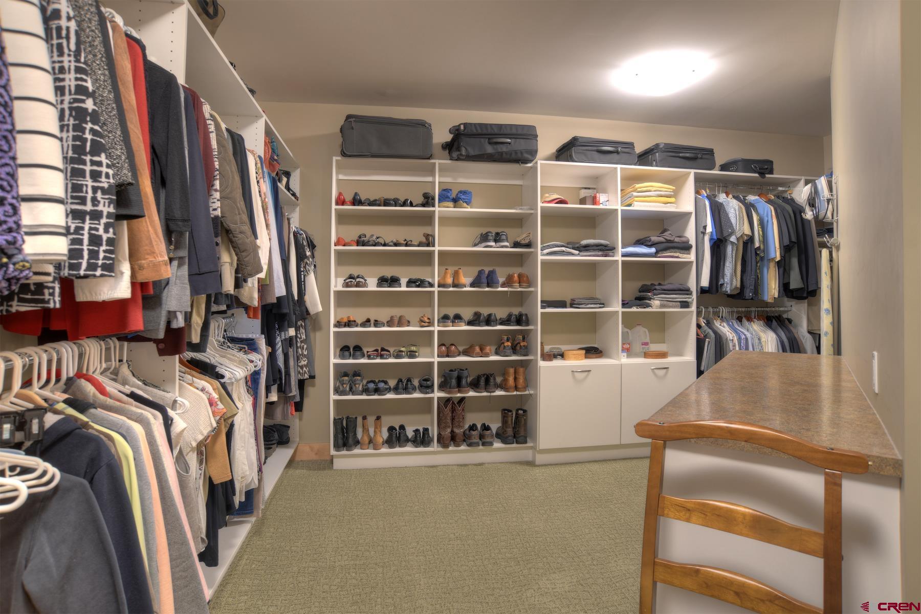 15 Eagle Ridge Road Durango, CO 81301 - Photo 17 of 35 a view of walk in closet with clothes and shoes