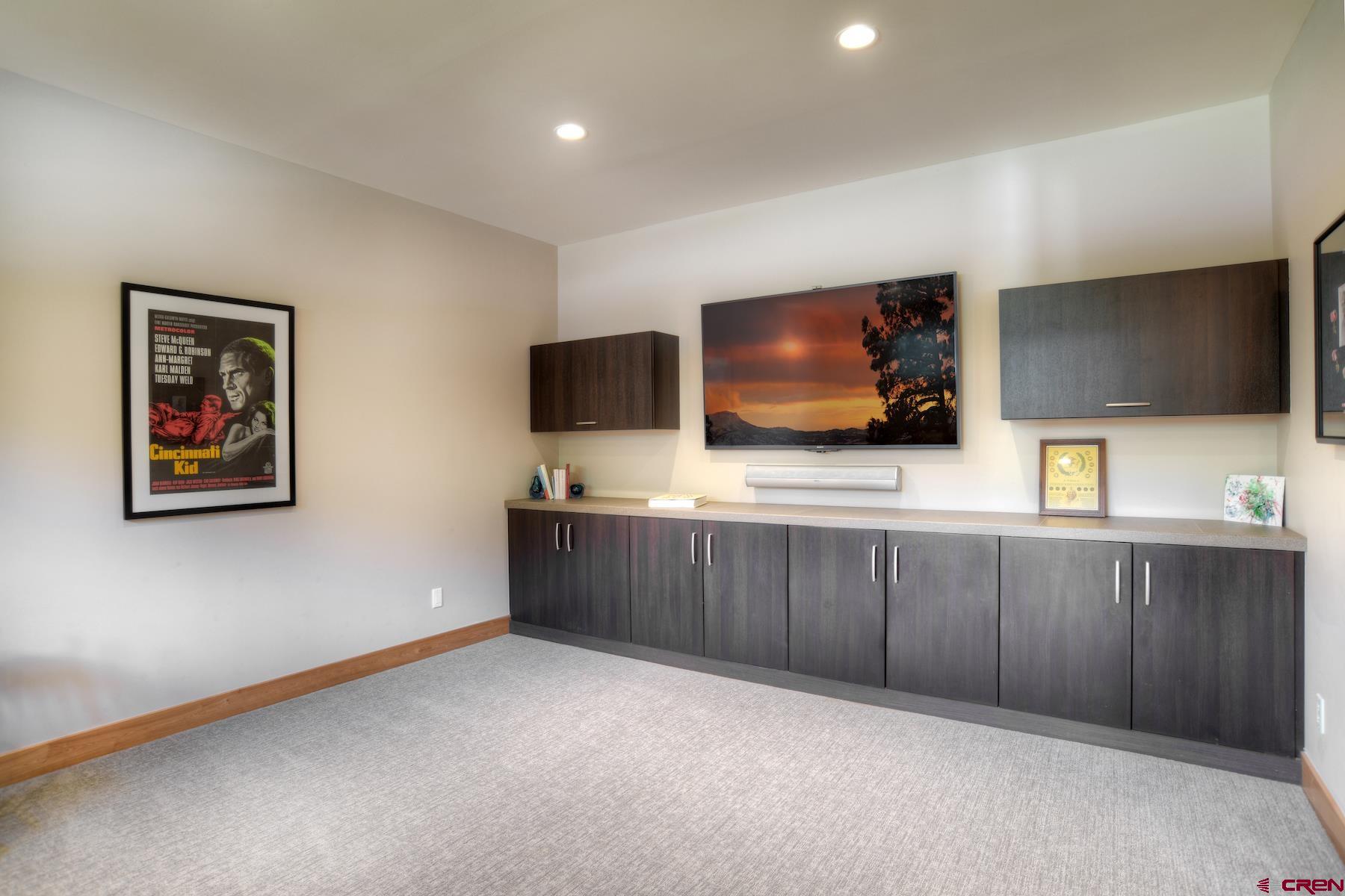 15 Eagle Ridge Road Durango, CO 81301 - Photo 18 of 35 a living room with furniture and a flat screen tv