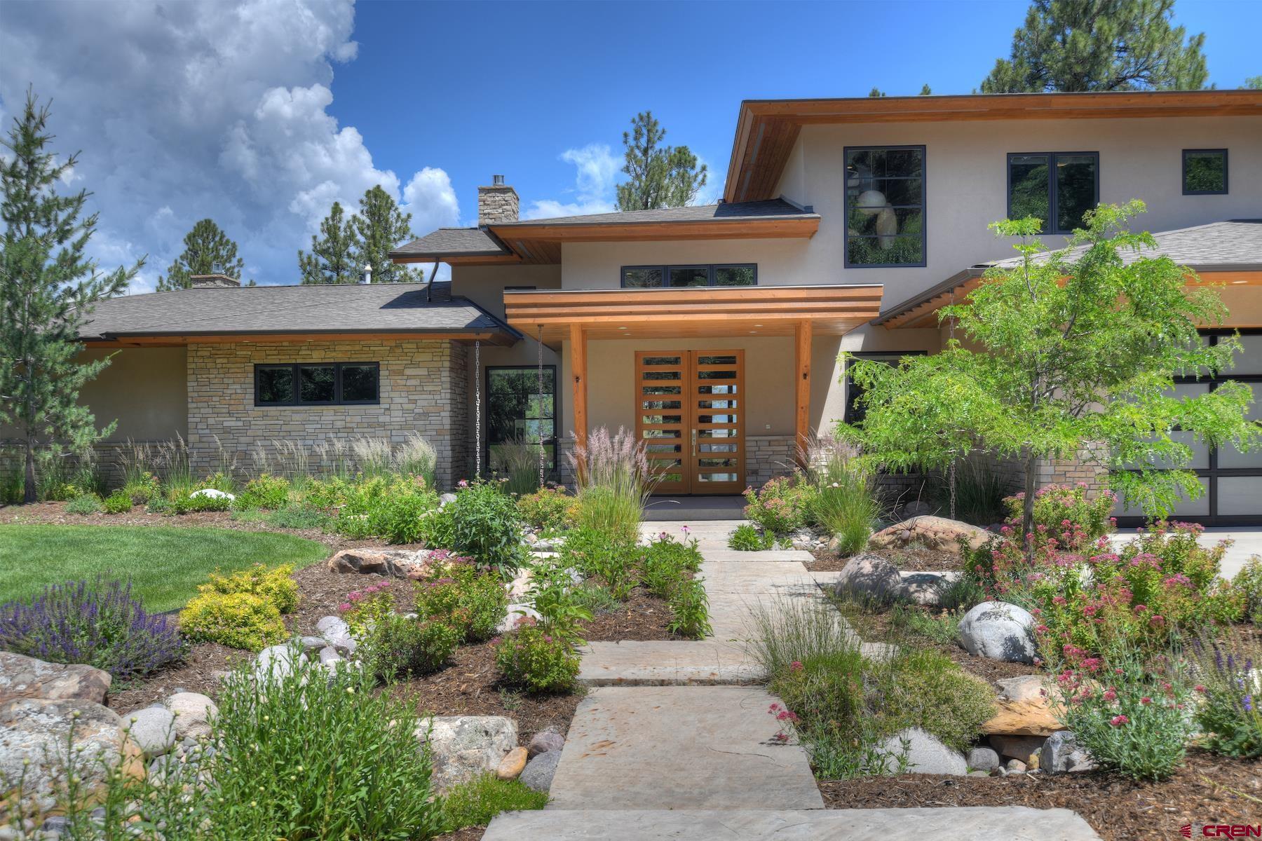 15 Eagle Ridge Road Durango, CO 81301 - Photo 2 of 35 front view of a house with a yard