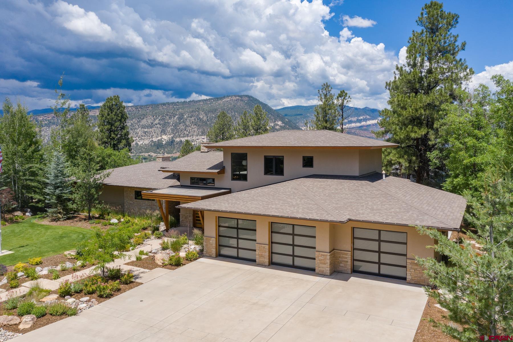 15 Eagle Ridge Road Durango, CO 81301 - Photo 34 of 35 a view of a house with a garden and pathway