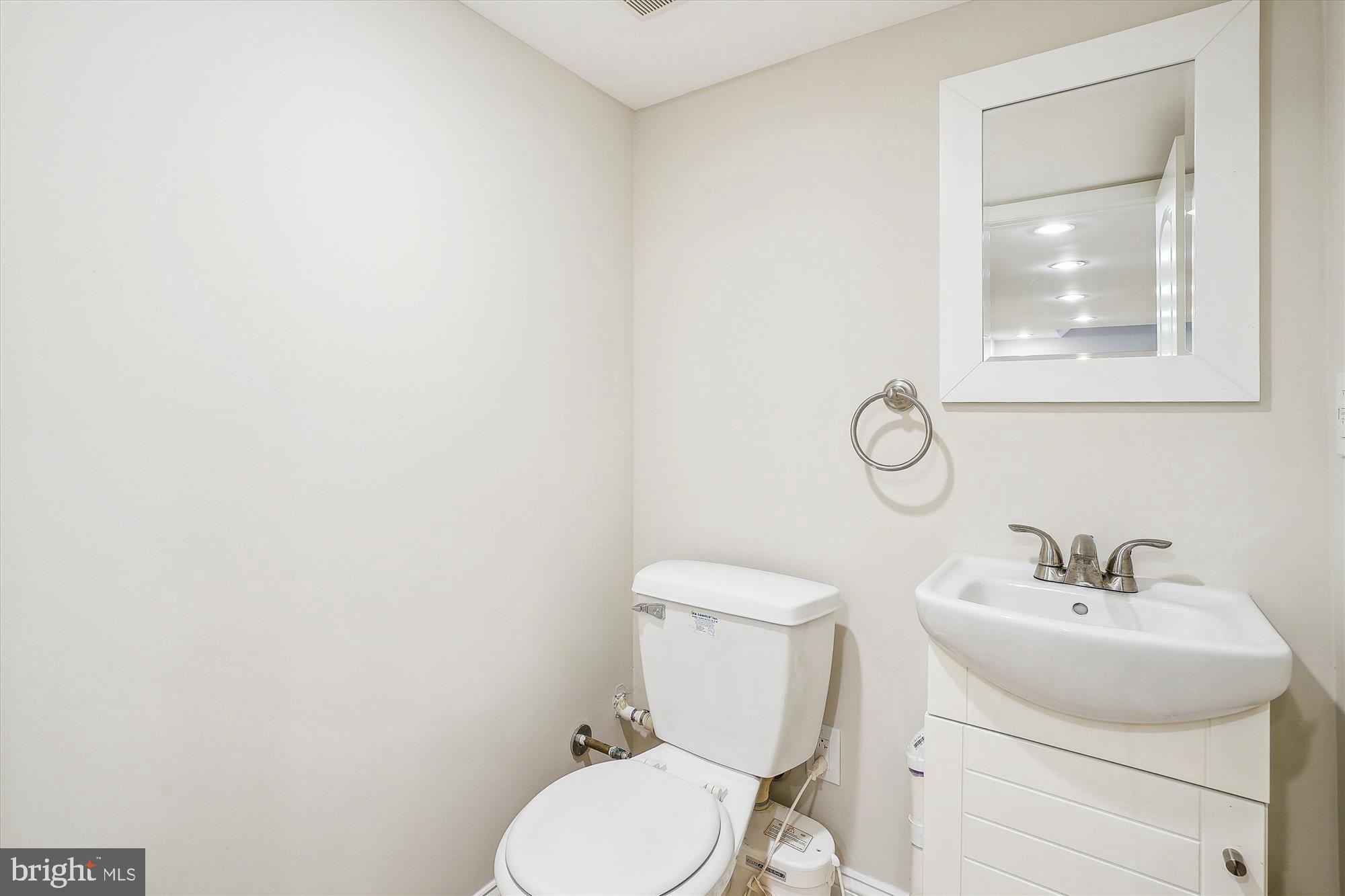 12377 Henderson Road Clifton, VA 20124 - Photo 50 of 85 Lower level half bath
