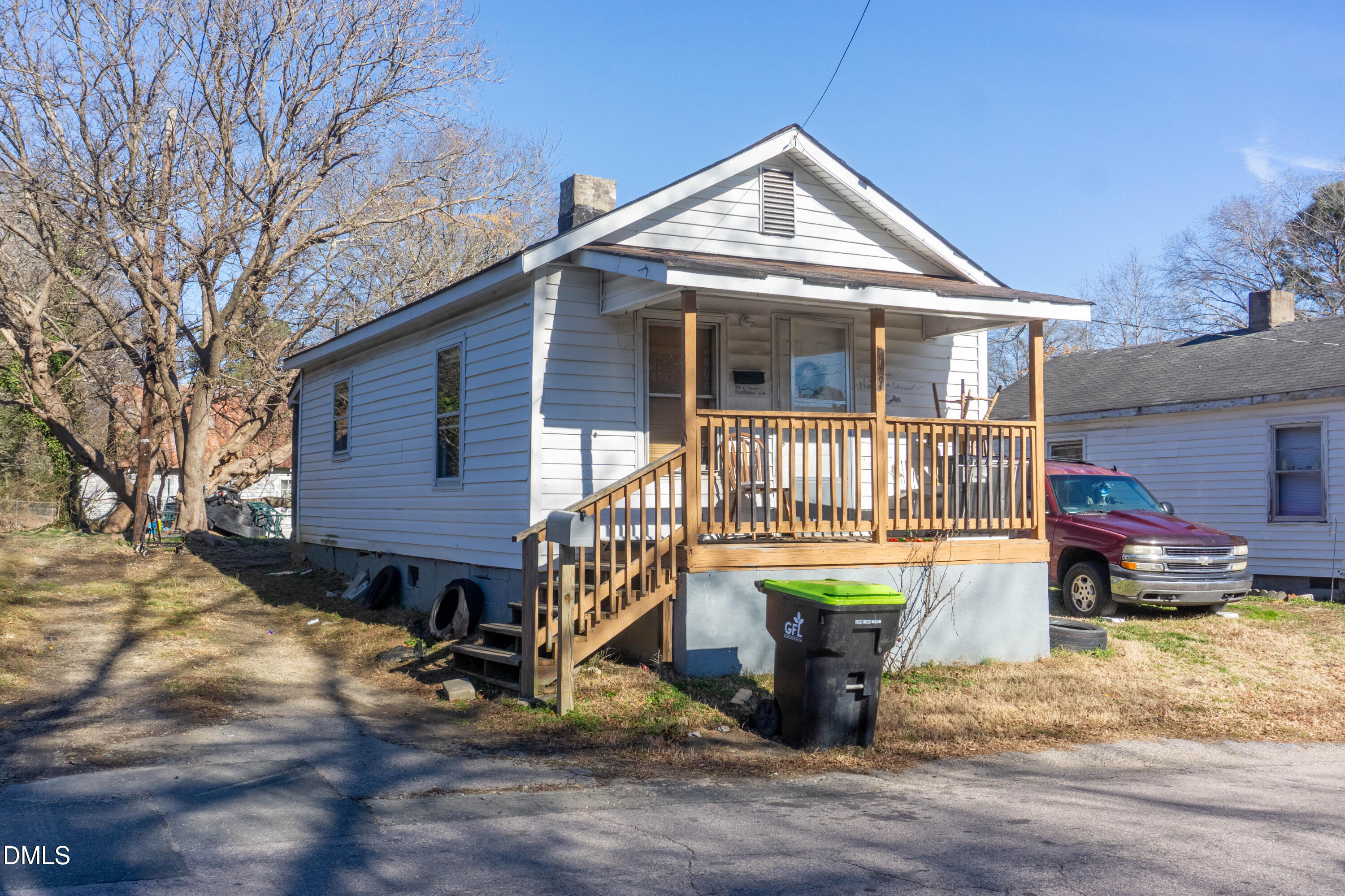 647 Marshall Street Henderson, NC 27536 - Photo 14 of 15 a front view of a house with a yard