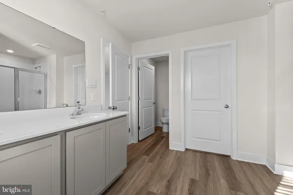 a bathroom with a sink and mirror