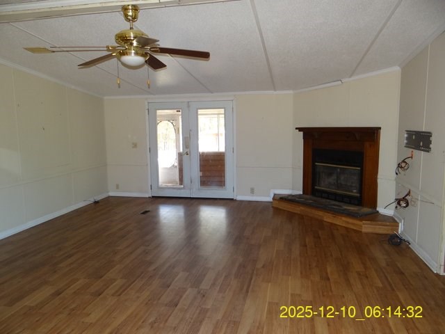 641 Cusseta Highway Box Springs, GA 31801 - Photo 12 of 18 a view of an empty room with a window and wooden floor