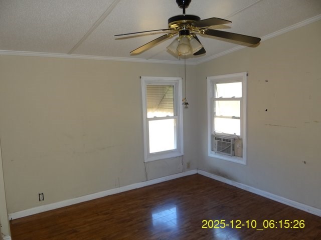 641 Cusseta Highway Box Springs, GA 31801 - Photo 15 of 18 an empty room with wooden floor fan and windows