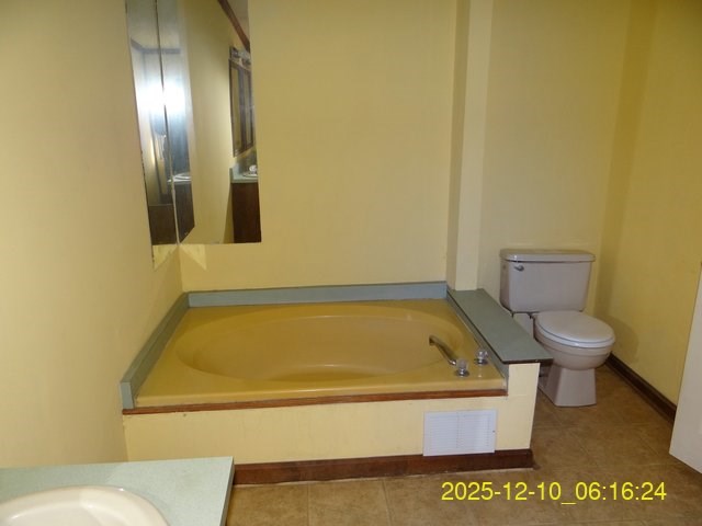 641 Cusseta Highway Box Springs, GA 31801 - Photo 18 of 18 a bathroom with a toilet and tub