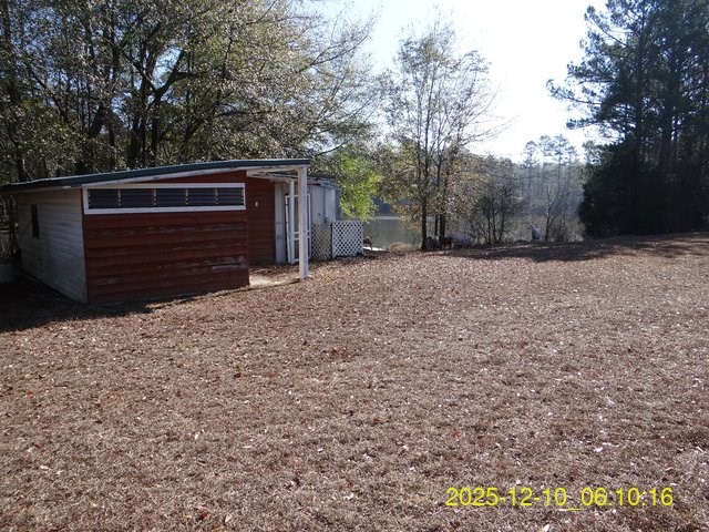 641 Cusseta Highway Box Springs, GA 31801 - Photo 5 of 18 a front view of a house with a yard