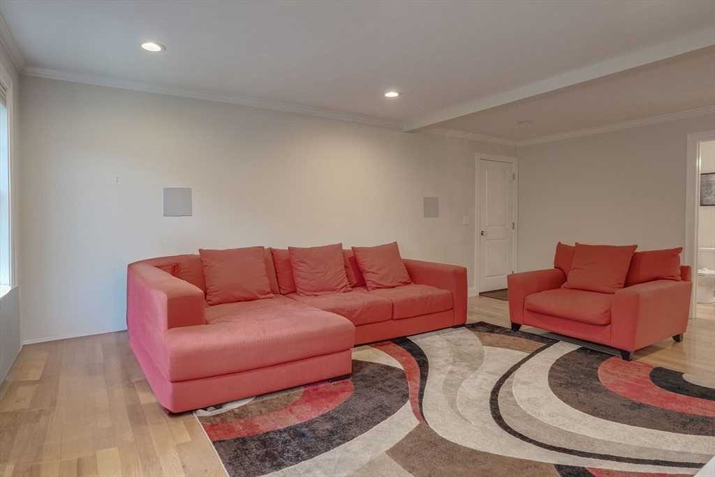 83 Littleton Road Ayer, MA 01432 - Photo 13 of 42 a living room with furniture and a couch