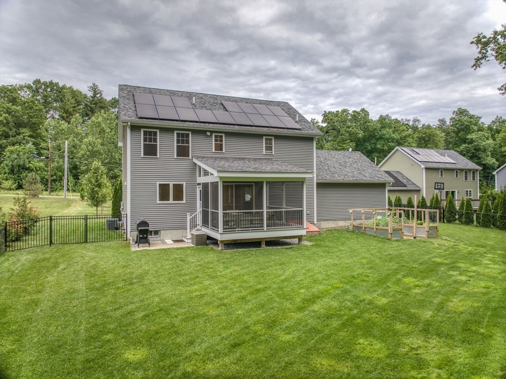 83 Littleton Road Ayer, MA 01432 - Photo 2 of 42 a view of a house with a yard and sitting area