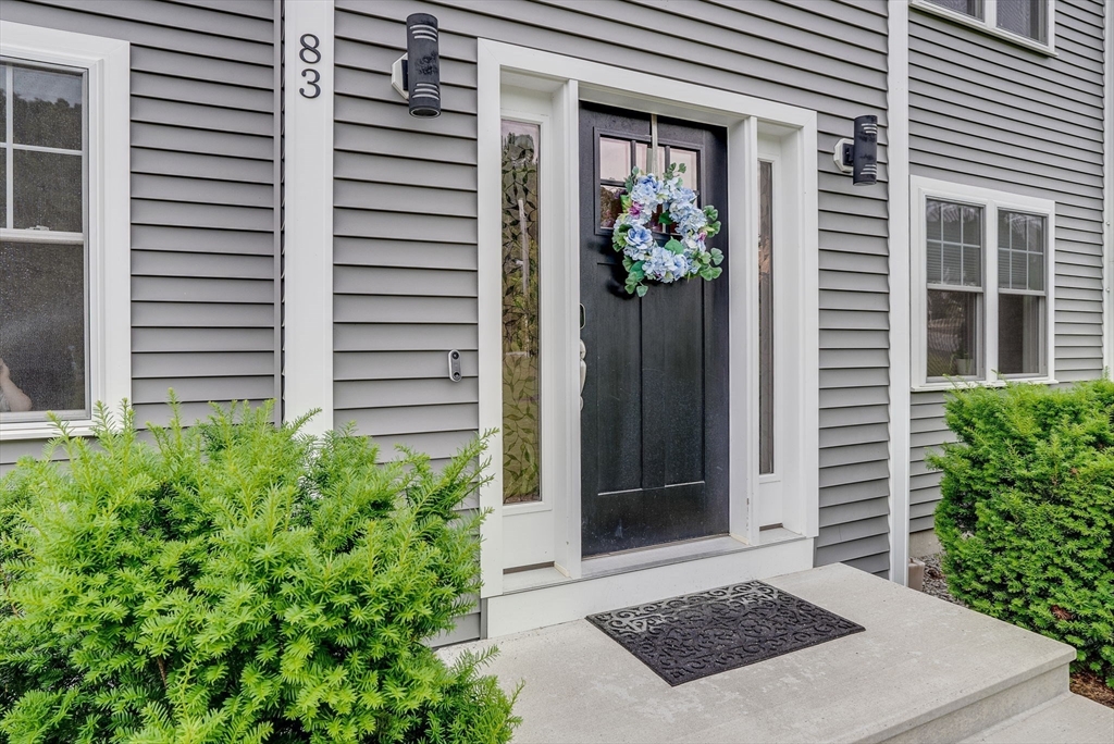 83 Littleton Road Ayer, MA 01432 - Photo 25 of 42 a view of a entryway in front of house