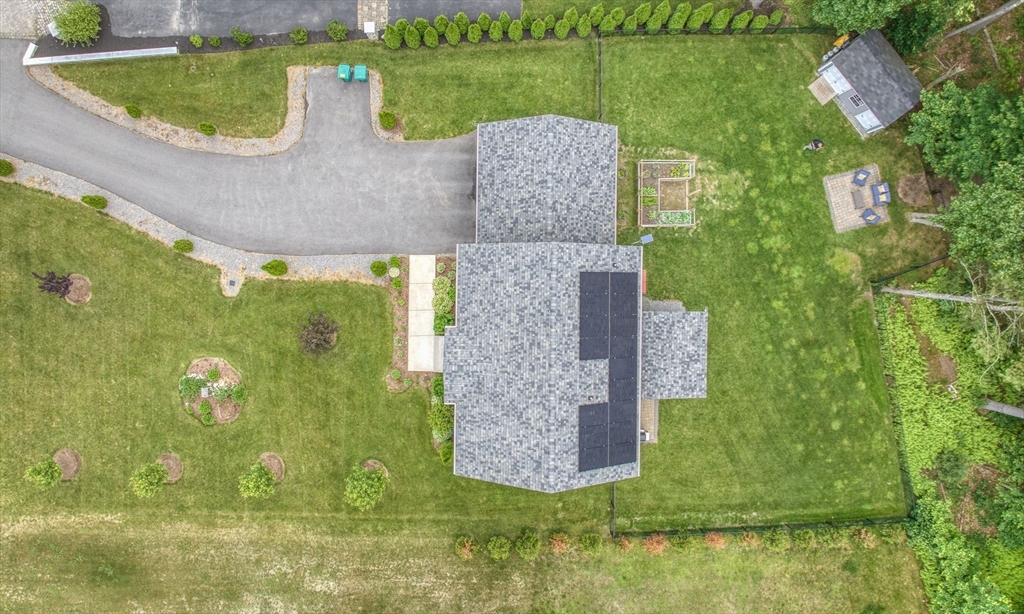 83 Littleton Road Ayer, MA 01432 - Photo 39 of 42 an aerial view of a house with a yard and lake view