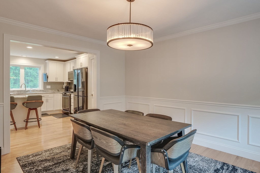 83 Littleton Road Ayer, MA 01432 - Photo 9 of 42 a view of a dining room with furniture