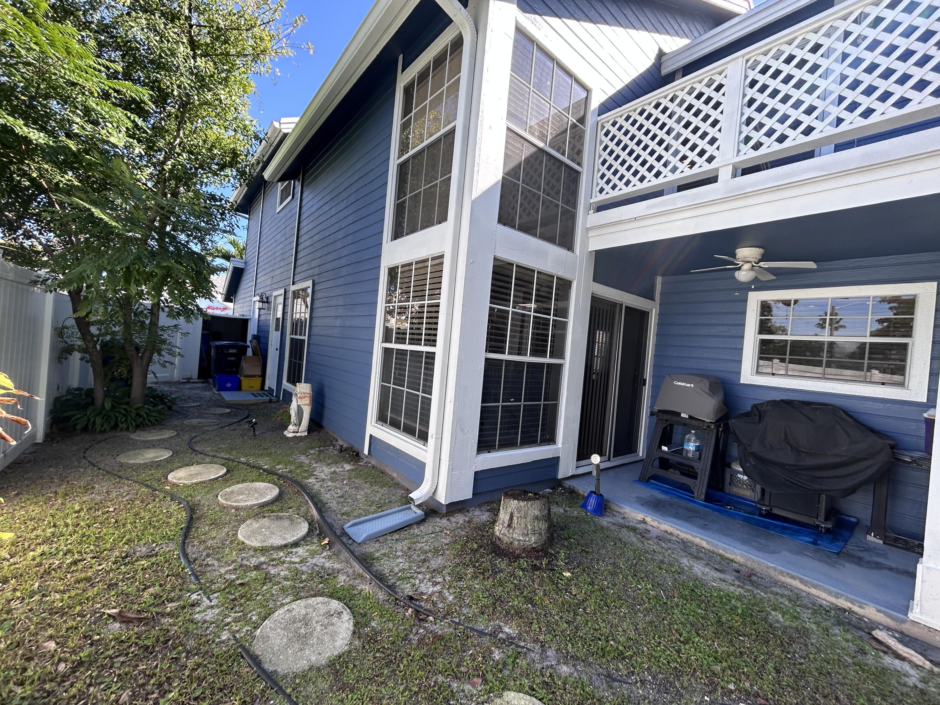 21437 54th Drive South Boca Raton, FL 33431 - Photo 13 of 15 a view of a porch with furniture
