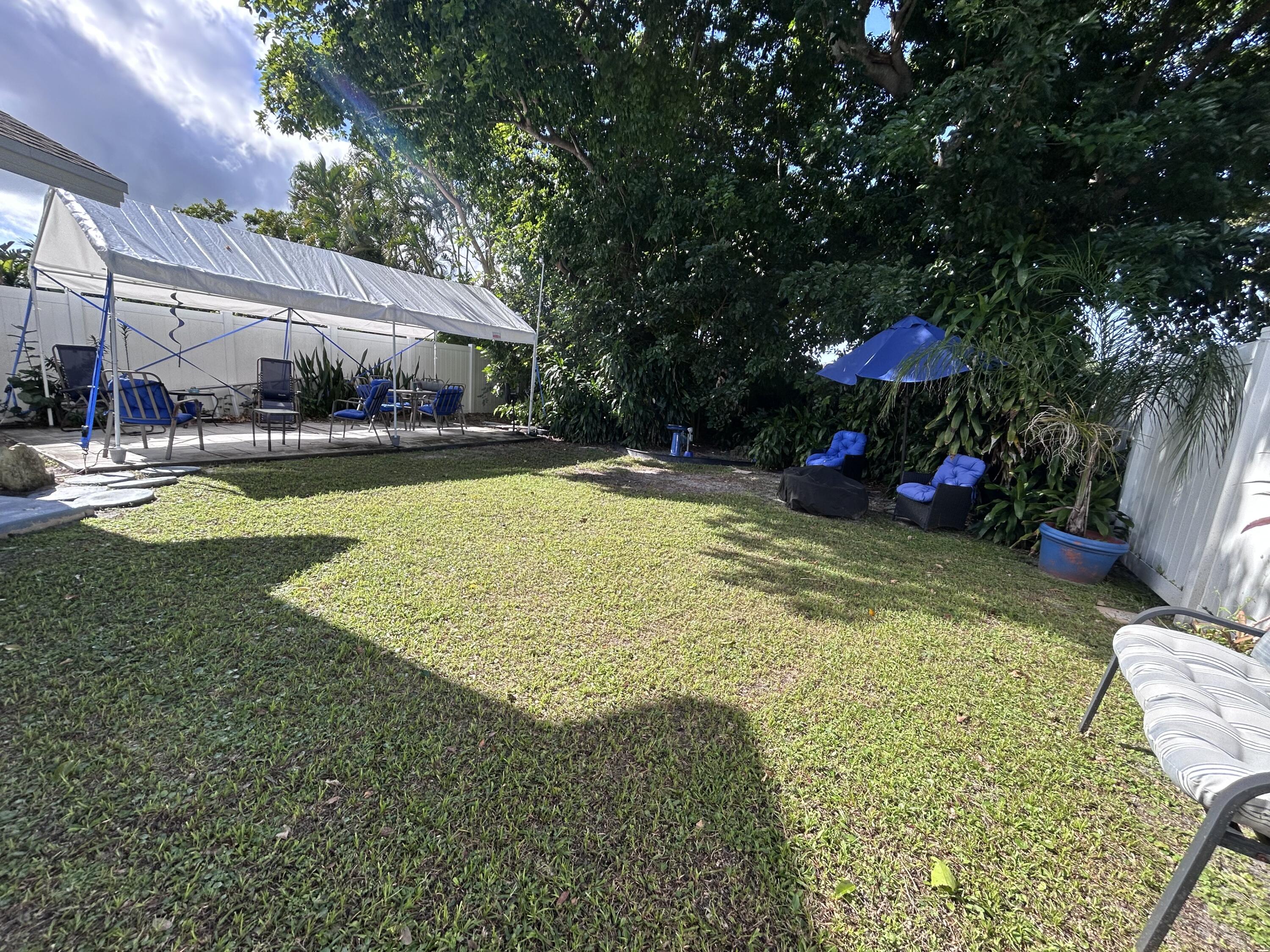 21437 54th Drive South Boca Raton, FL 33431 - Photo 14 of 15 a view of a swimming pool with a patio