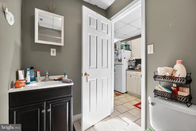 a utility room with cabinets