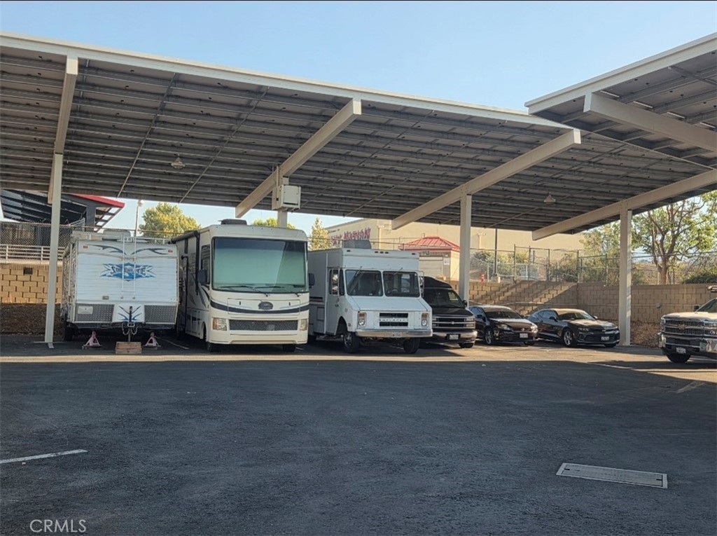 1550 Rimpau Avenue, Unit 20 Corona, CA 92881 - Photo 24 of 42 a view of a car parking garage