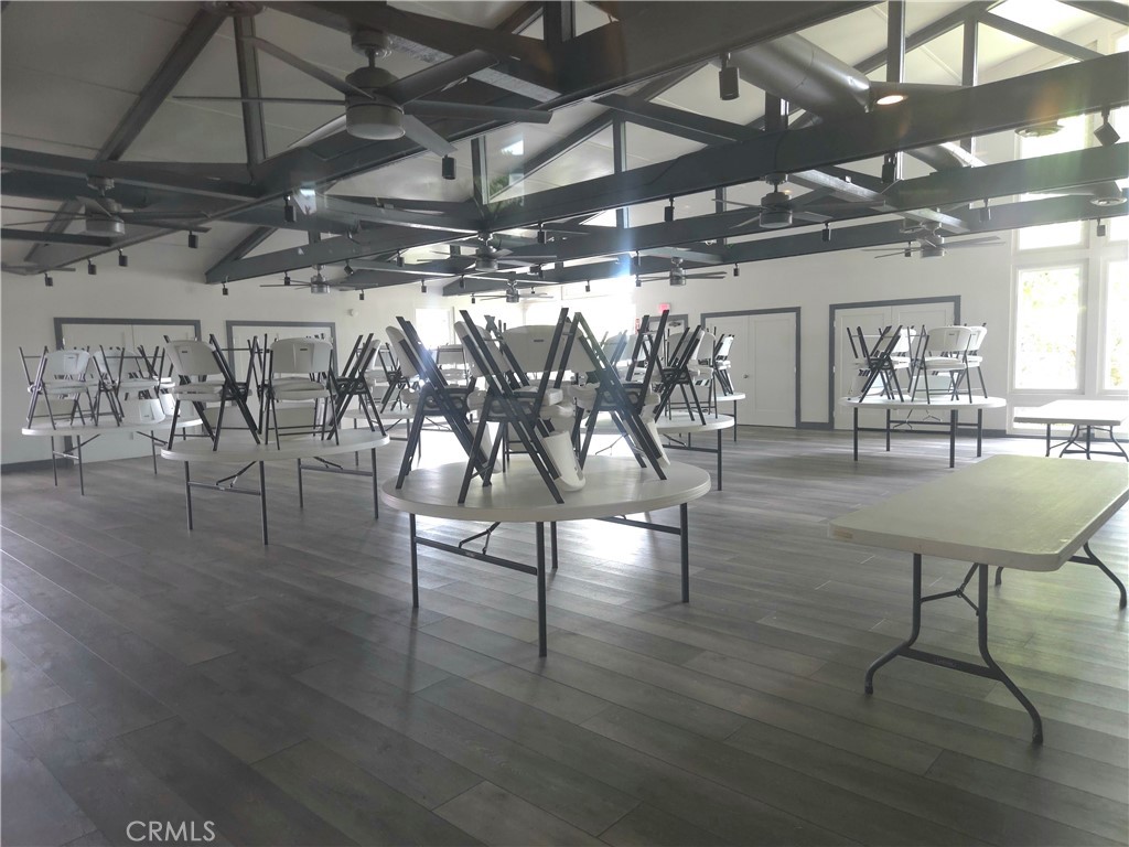 1550 Rimpau Avenue, Unit 20 Corona, CA 92881 - Photo 33 of 42 a view of a room with lots of wooden furniture