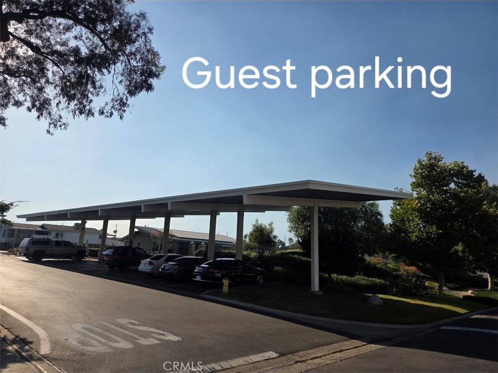 1550 Rimpau Avenue, Unit 20 Corona, CA 92881 - Photo 37 of 42 a view of street with parking