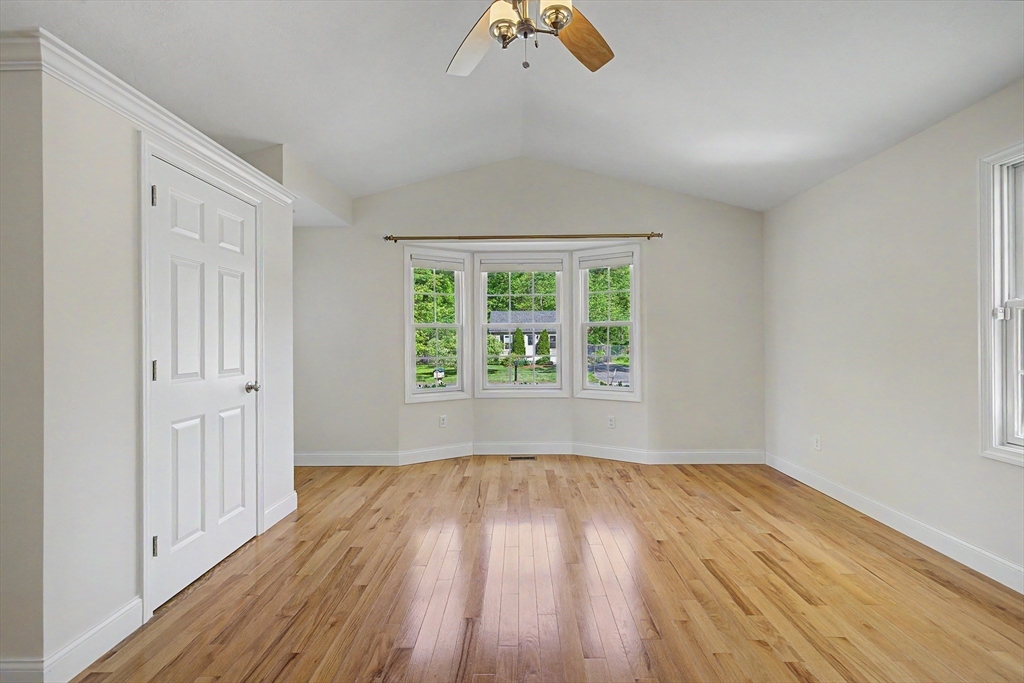 792 Ryan Road Northampton, MA 01062 - Photo 11 of 29 wooden floor in an empty room with a window