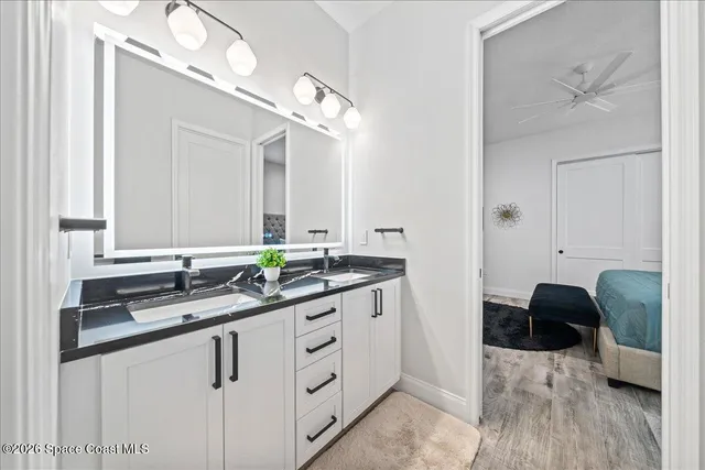a front view of a house with a yard table and chairs