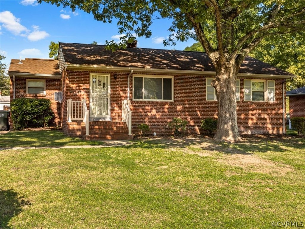 906 Pierpont Road Richmond, VA 23225 - Photo 1 of 24 a front view of house with yard