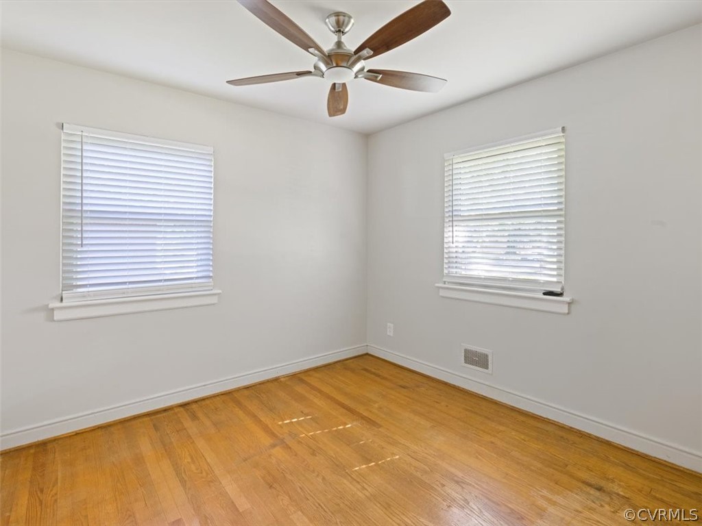 906 Pierpont Road Richmond, VA 23225 - Photo 17 of 24 a view of a room with a window and a ceiling fan