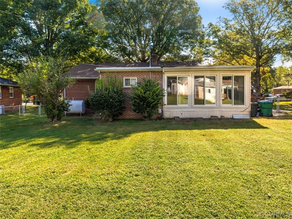 906 Pierpont Road Richmond, VA 23225 - Photo 24 of 24 a view of house with a swimming pool