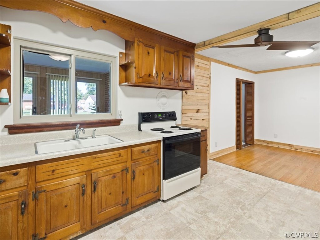 906 Pierpont Road Richmond, VA 23225 - Photo 8 of 24 a kitchen with granite countertop a sink stainless steel appliances and cabinets