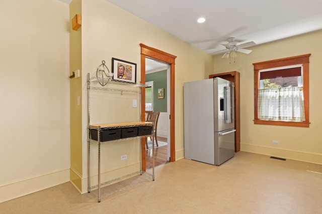 7009 34th Street Berwyn, IL 60402 - Photo 14 of 30 a view of an empty room with window and refrigerator