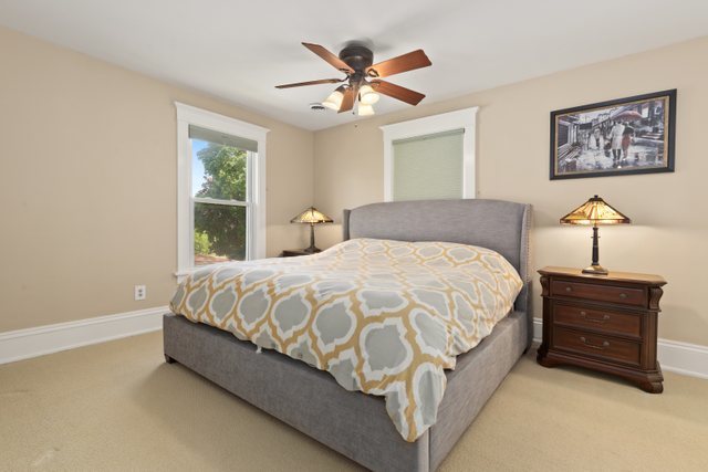 7009 34th Street Berwyn, IL 60402 - Photo 16 of 30 a bedroom with a bed and window