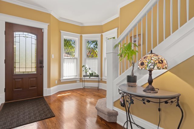 7009 34th Street Berwyn, IL 60402 - Photo 2 of 30 a living room with furniture and a window