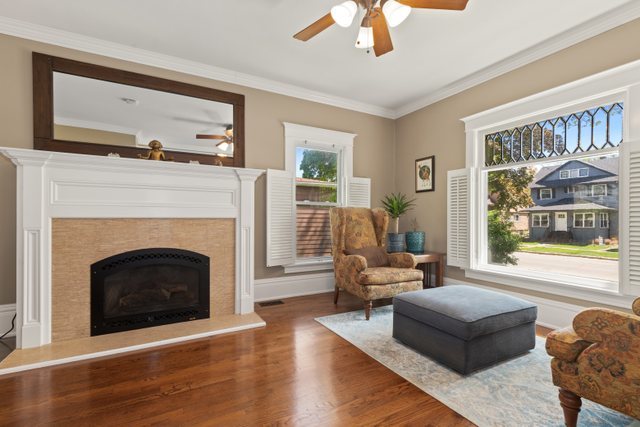 7009 34th Street Berwyn, IL 60402 - Photo 3 of 30 a living room with furniture and a fireplace