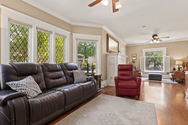 7009 34th Street Berwyn, IL 60402 - Photo 6 of 30 a living room with furniture and a large window