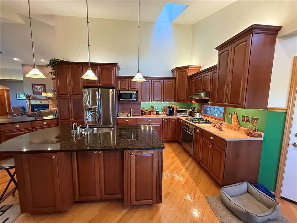 181 View Street Indiana, PA 15701 - Photo 18 of 34 a kitchen with wooden cabinets and a sink