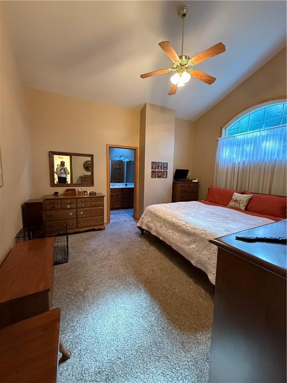 181 View Street Indiana, PA 15701 - Photo 23 of 34 a bedroom with a bed and a chandelier