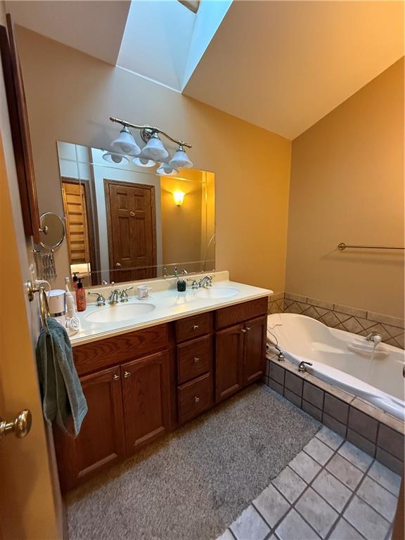 181 View Street Indiana, PA 15701 - Photo 24 of 34 a bathroom with a double vanity sink and a mirror
