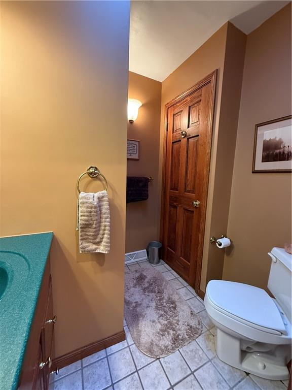 181 View Street Indiana, PA 15701 - Photo 30 of 34 a bathroom with a granite countertop toilet and a sink