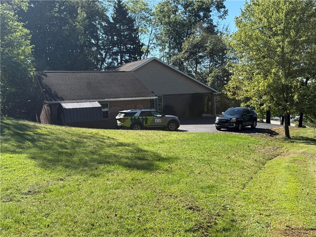 181 View Street Indiana, PA 15701 - Photo 5 of 34 a view of house with backyard space and trees