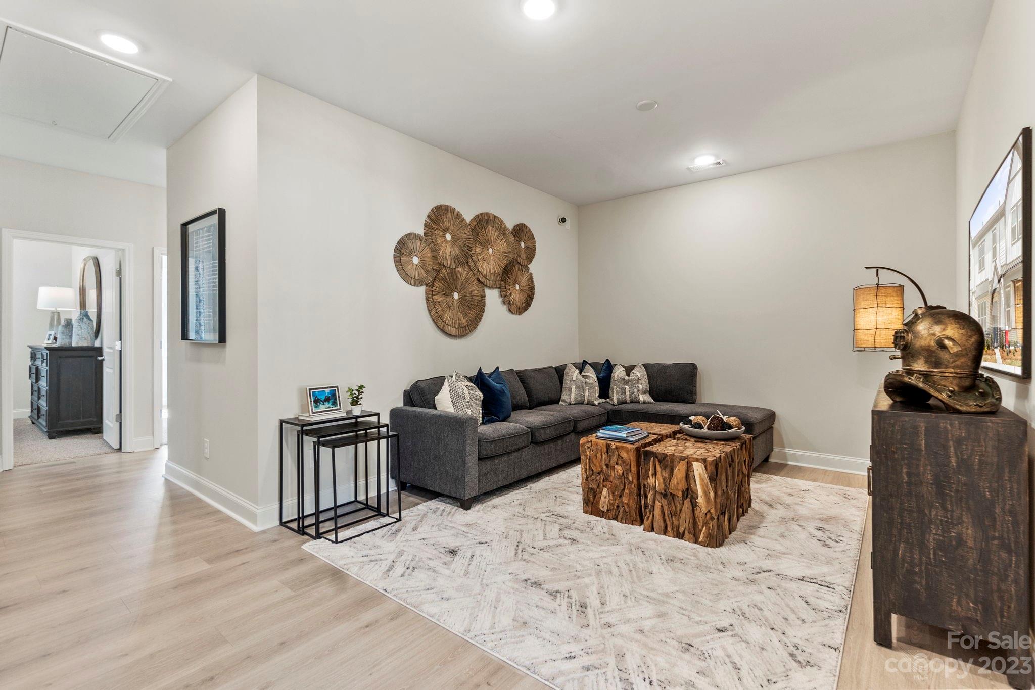 8915 Winding Waters Road Harrisburg, NC 28215 - Photo 17 of 30 a living room with furniture